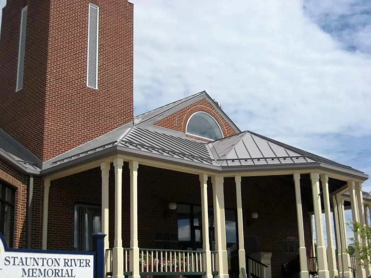 Skilled roofing craftsmen working on a residential roof in Butler